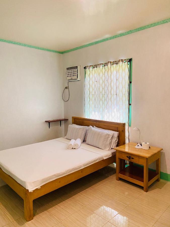 Uptown Guesthouse Siquijor Ruang foto